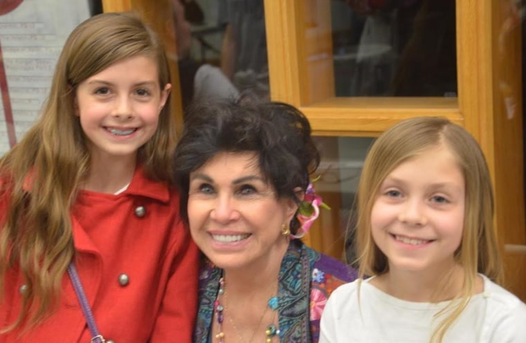 Dorinda Makanaonalani Nicholson with two of her granddaughters.