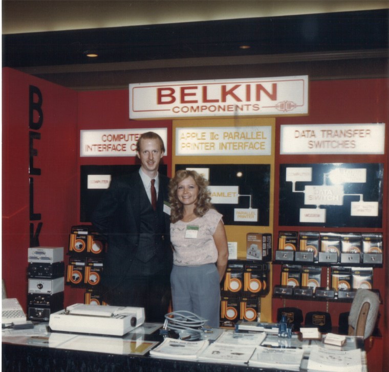 Belkin founder Chet Pipkin (left) at Belkin booth during Comdex Show (CES), 1984.