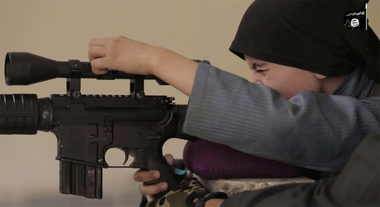 Image: A child who indicated that his name is Yousef, 10 years old speaks in an ISIS video titled "The Fertile Nation, part 4."