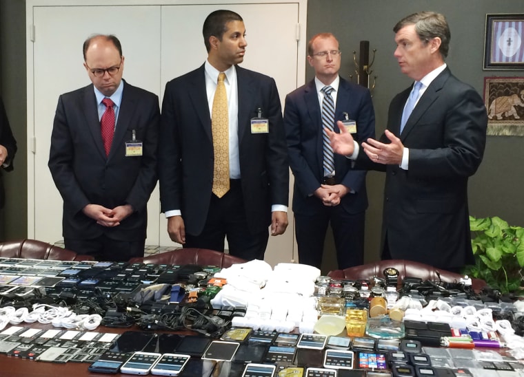 Image: Hundreds of cellphones are displayed after they were seized in a raid from the Lee Correctional Institution, S.C.