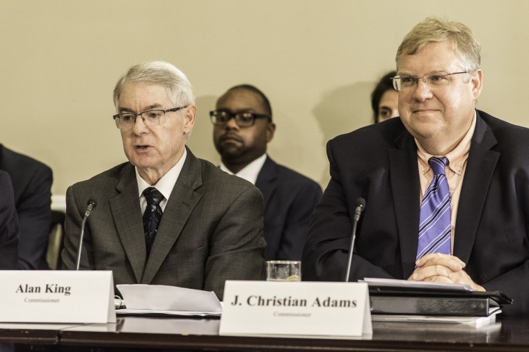 Image: Commissioners Alan King, left, and  J. Christian Adams.