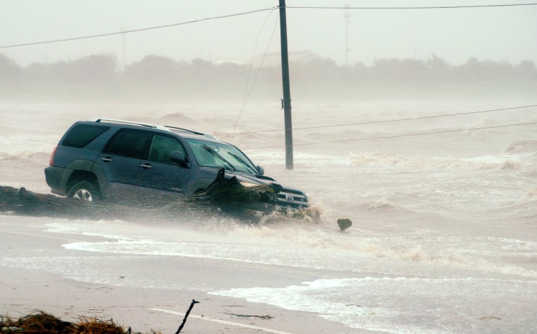 Image: A Car is Surrounded by Floodwaters from Hurricane Harvey in Point Comfort