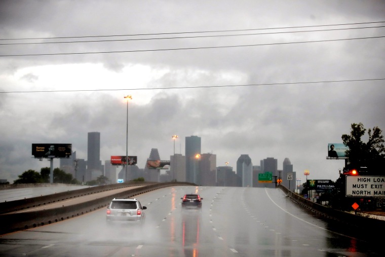 Image: Hurricane Harvey batters downtown Houston, Saturday.