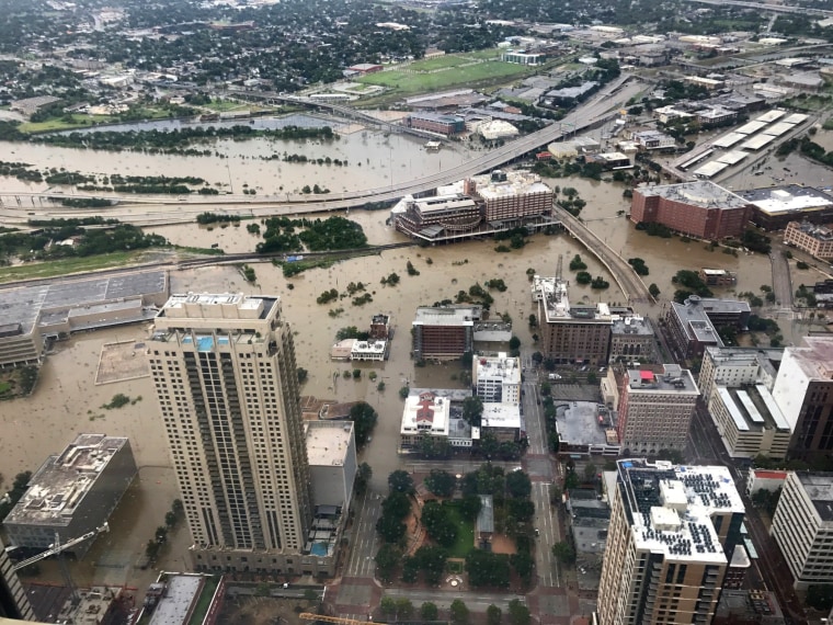 Image: Flooded downtown is seen from JP Morgan Chase Tower after Hurricane Harvey inundated the Texas Gulf coast with rain causing widespread flooding, in Houston