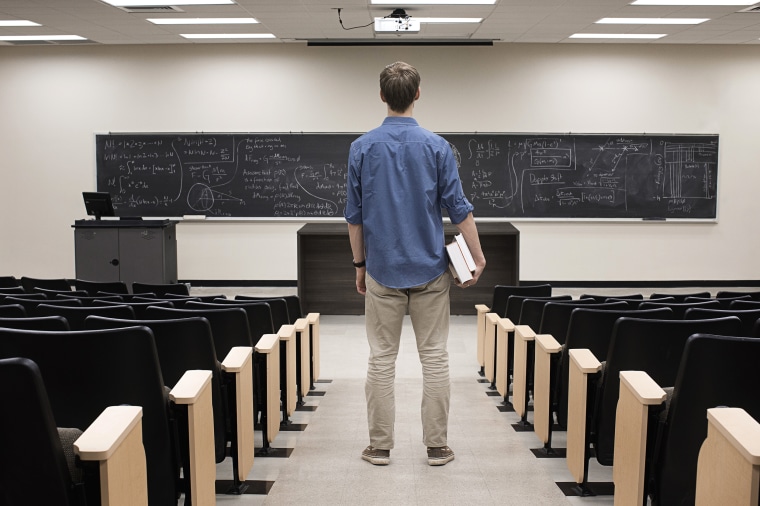 Image: Caucasian Student Standing in Classroom