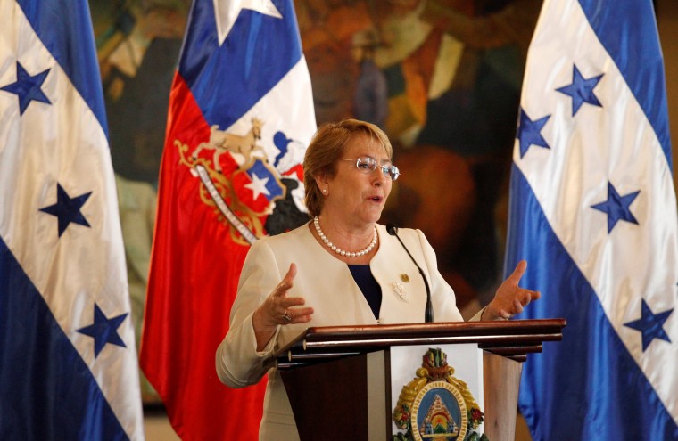 Image: Chile's President Michelle Bachelet gives a speech to the media during a news conference  at the presidential palace in Tegucigalpa