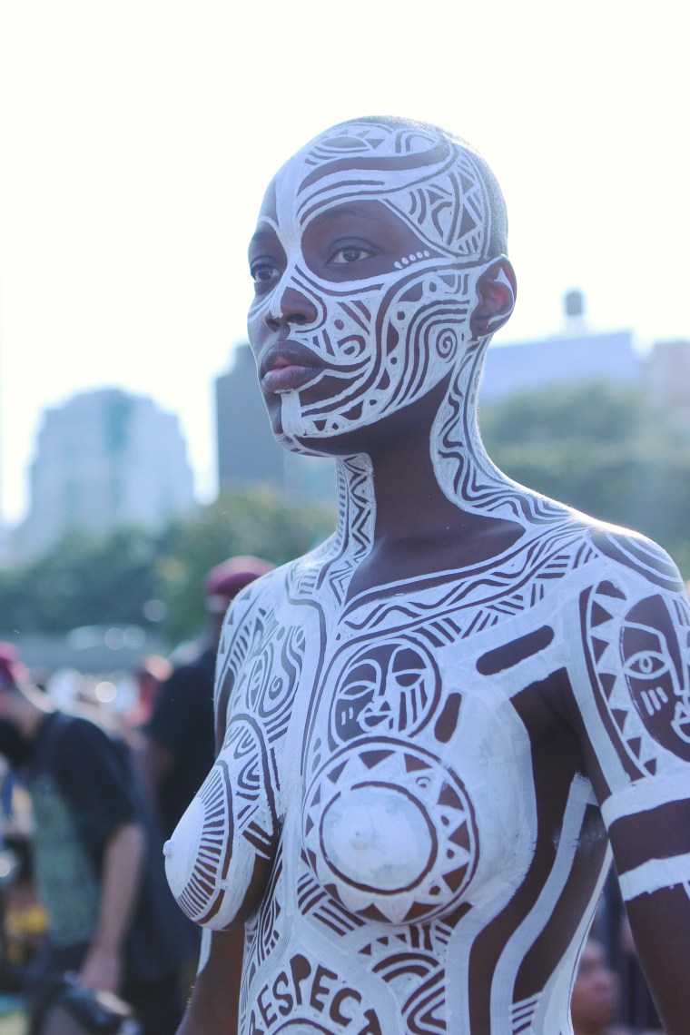 Image: Model Folasade is covered in art from Nigerian artist Laolu at AFROPUNK