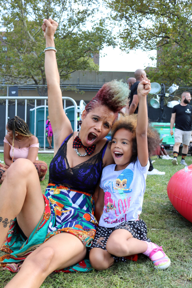 Image: Staceyann Chin and her daughter Zuri at Afropunk Festival