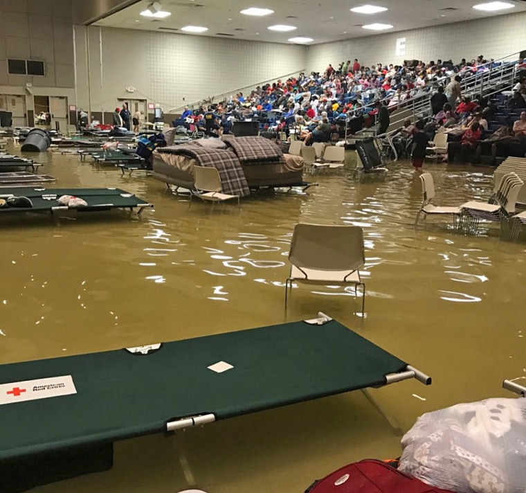 Water fills the Bob Bower Civil Center in Port Arthur, Texas, where evacuees had been taking shelter.