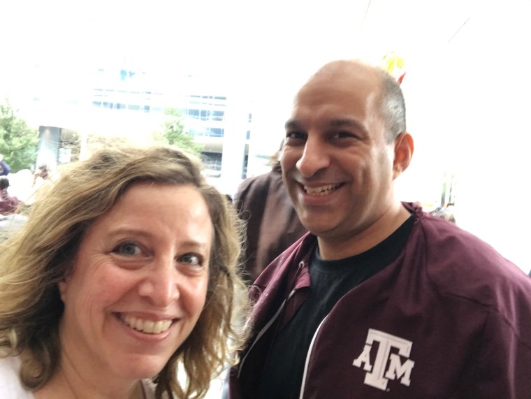 Image: Houston attorney and resident Beto Cardenas and fellow volunteer Karen Penner have been helping out at Houston's convention center