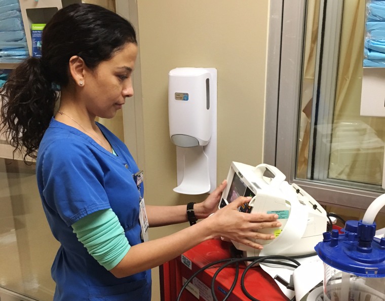 Image: Norma Bustamante Cardenas is working extra shifts at Houston's Texas Medical Center