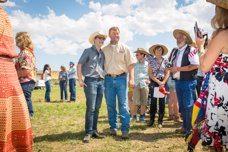 Image: Dean Heller, center right, poses for pictures