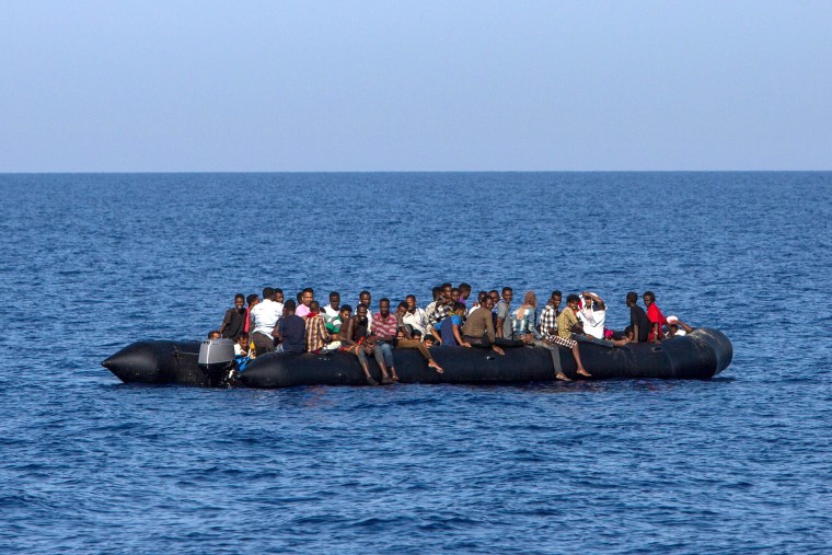 Image: Migrants await rescue off Libya's coast on Aug. 6, 2017