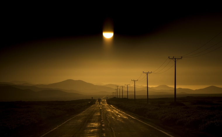Image: A road stretches along the Atacama desert in Chile's Huasco region