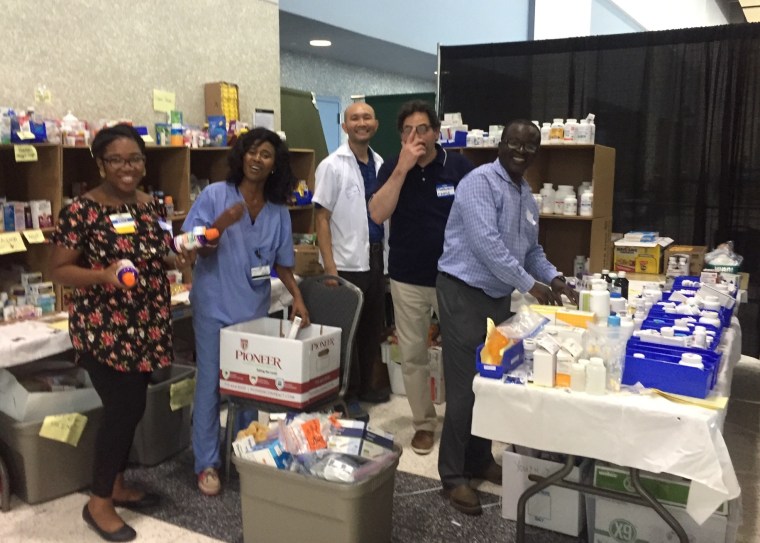 Enock Anassi is a pharmacist who has been volunteering his time assisting Harvey evacuees at NRG Stadium.