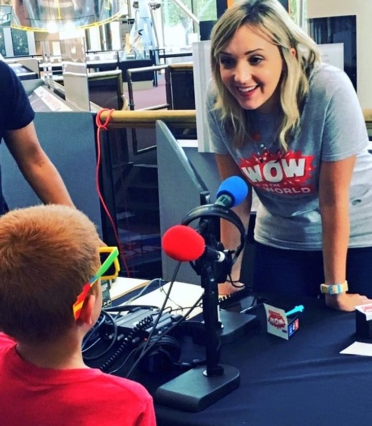 Mindy Thomas with a "Wow in the World" listener at an event in Washington, D.C.