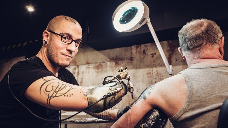 Gonzal & JC Sheitan - First Prosthetic Tattoo Arm
Guinness World Records 2016
Photo Credit: Olivier Ramonteu/Guinness World Records
Pictured: tattoo artist JC Sheitan