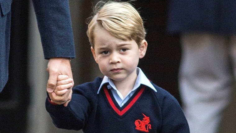 Britain's Prince William accompanies his son Prince George on his first day of school at Thomas's school in Battersea, London