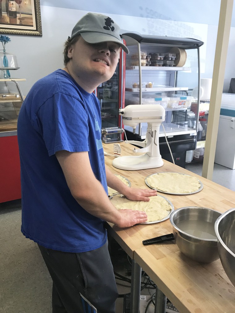 Jacob Wittman works on dough