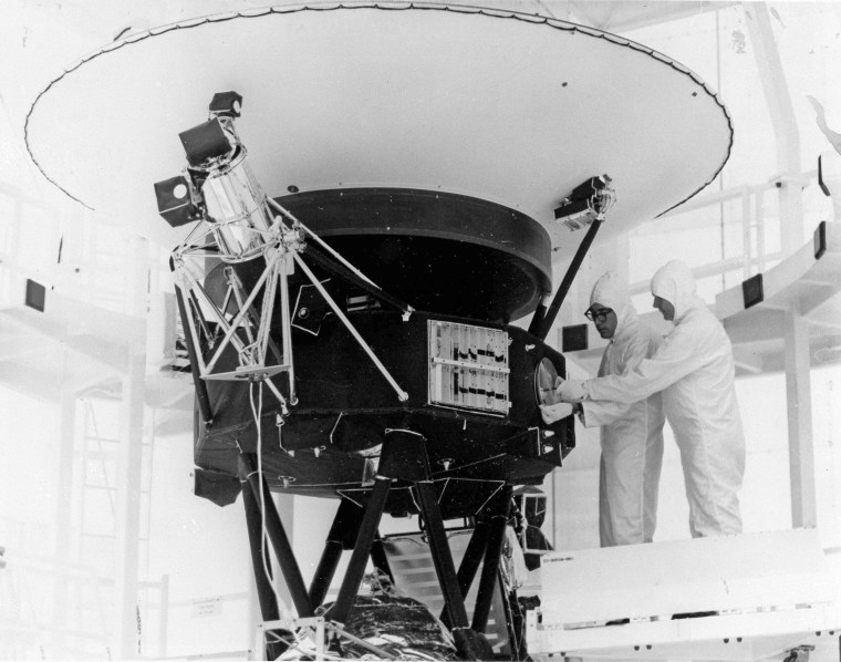 The \"Sounds of Earth\" record is mounted on the Voyager 2 spacecraft at the Kennedy Space Center on Aug. 4, 1977.