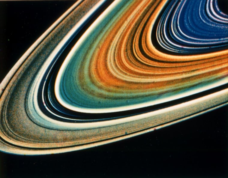 Possible variations in chemical composition from one part of Saturn's ring system to another are visible in this archival image from NASA's Voyager 2.