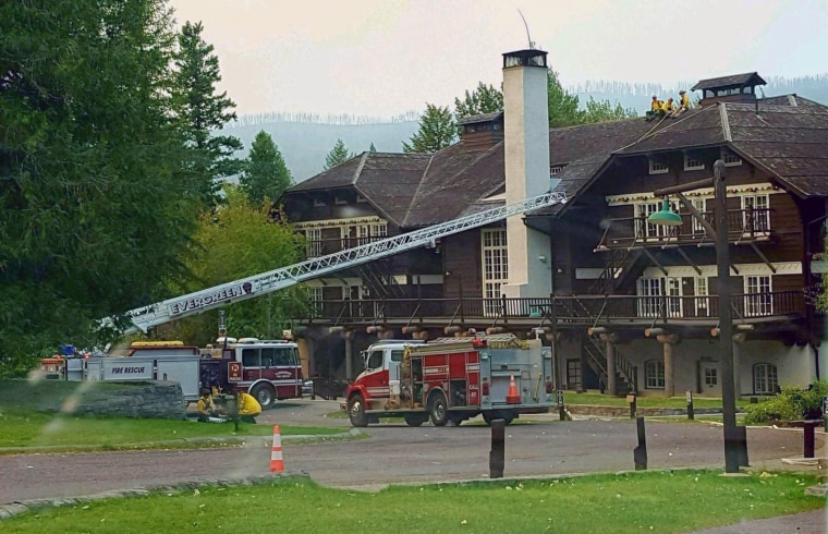 Image: A fire truck is positioned outside Lake McDonald Lodge