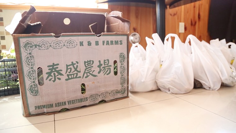 Produce in bags at East Asian Fusion restaurant in New Jersey, a pick-up point for Weee!, a group buying startup that uses the social messaging app WeChat.