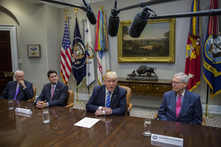 Image: Donald Trump delivers remarks during a meeting with members of Congress and his administration regarding tax reform