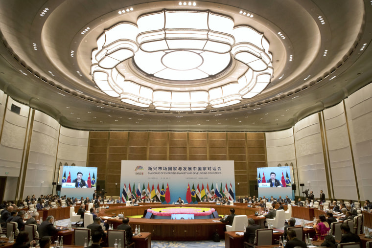 Image: Leaders attend the Dialogue of Emerging Market and Developing Countries