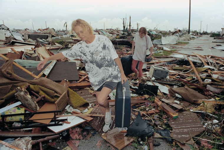 Image: Joan Wallach, left, and her daughter, Brenda, leave the Royal Palm Trailer Park in Homestead, Florida