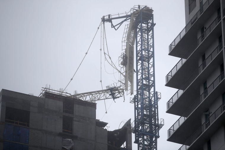 Image: A crane tower is seen after part of it collapsed from the hurricane winds in Miami on Sept. 10.