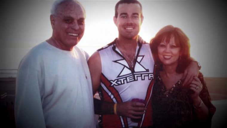 Carson with his mother and stepfather.