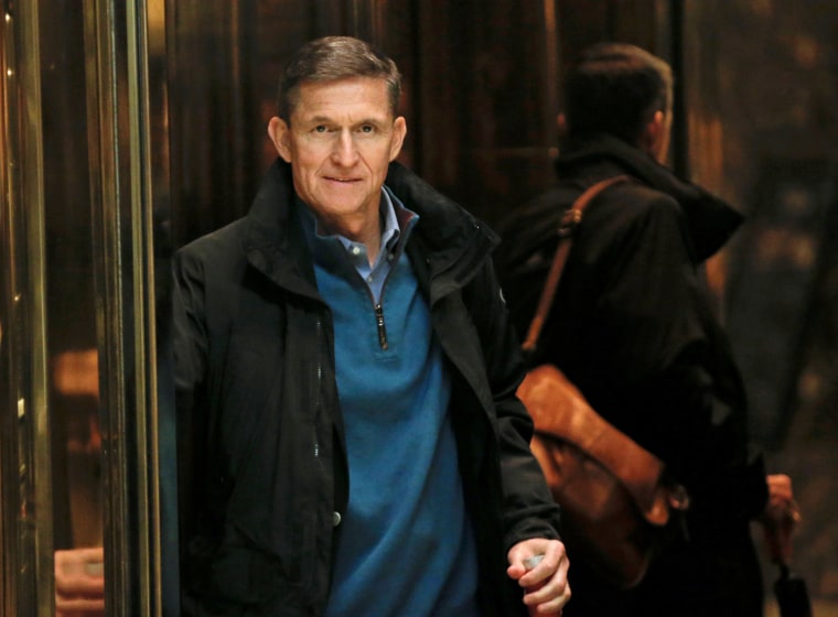 Image: Retired U.S. Army Lieutenant General Michael Flynn boards an elevator as he arrives at Trump Tower where U.S. President-elect Donald Trump lives in New York