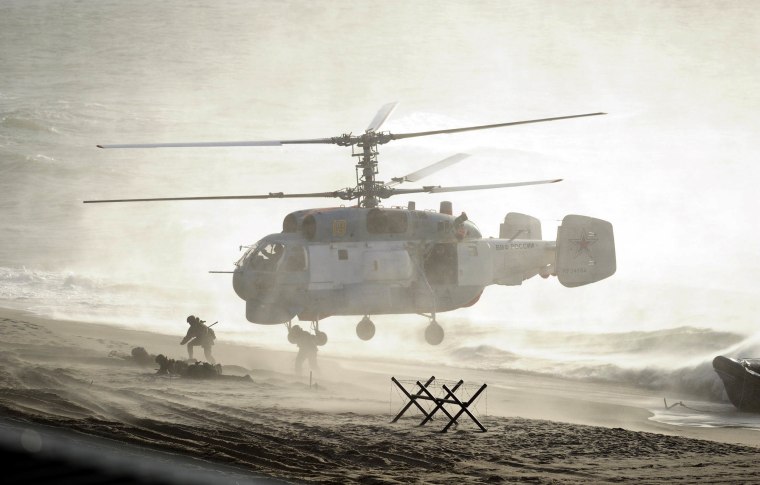 Image: Servicemen take part in the joint war games Zapad-2013