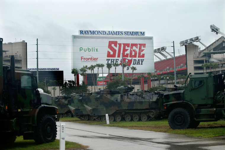 Image: Military equipment sits in the parking lot of Tampa's Raymond James stadium ahead of Hurricane Irma on Sept. 10.