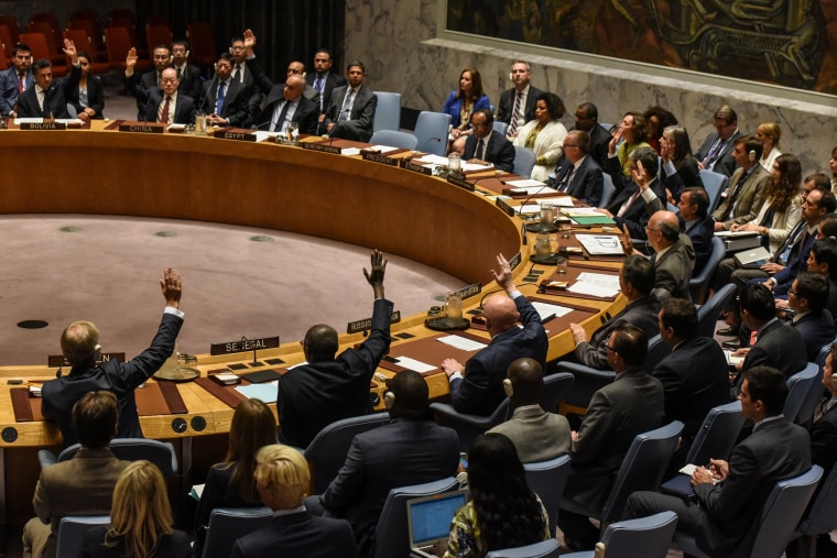 Image: Ambassadors to the UN vote during a United Nations Security Council meeting on North Korea in New York City