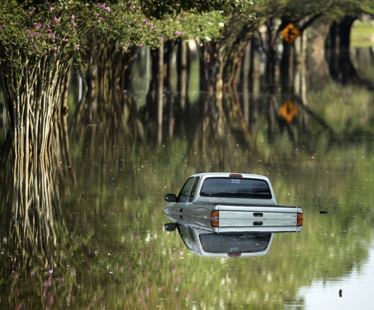 Image: A submerged pickup truck in Katy, Texas