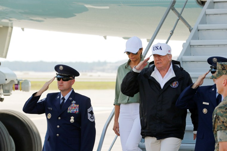 Image: U.S. President Trump steps off Air Force One prior to receiving a a briefing on Hurricane Irma relief efforts in Fort Myers, Florida