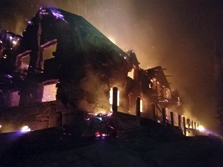 Image: Team shows The historic main Sperry Chalet building engulfed in flames in Glacier National Park, Montana, Aug. 31, 2017.