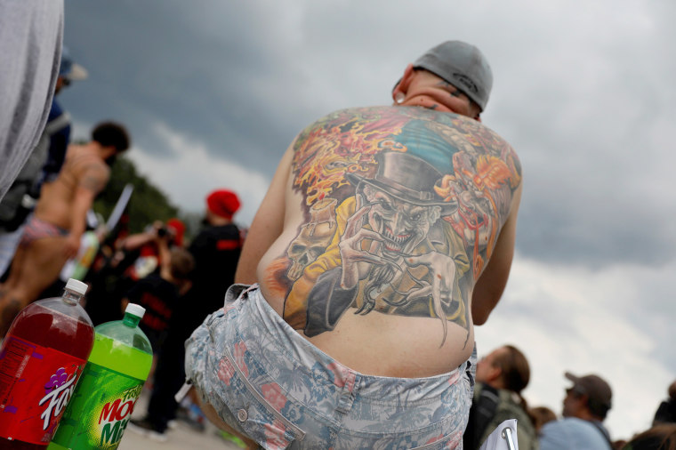 Image: Demonstrator with an ICP-themed tattoo looks on during the Juggalo March in Washington