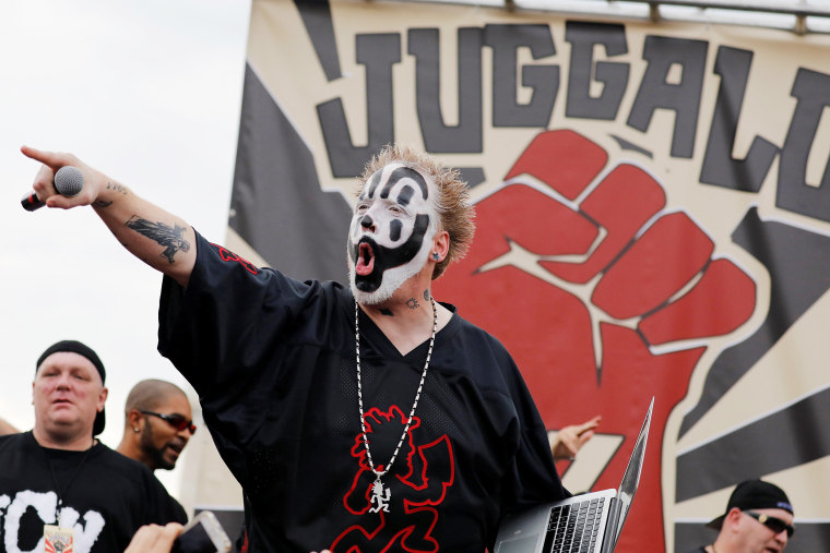 Image: Insane Clown Posse member Joseph Bruce, known by his stage name Violent J, arrives to speak to the crowd during the Juggalo March in Washington