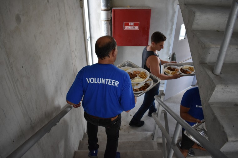 Volunteers deliver food in Miami to Hurricane Irma victims.