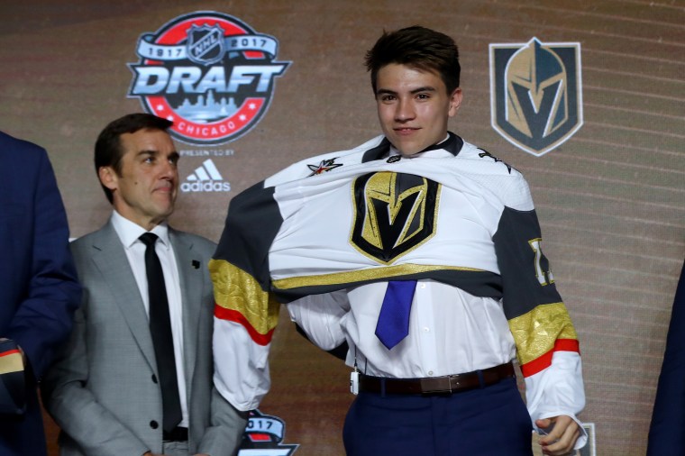 Image: Nick Suzuki puts on the Vegas Golden Knights jersey during the 2017 NHL draft