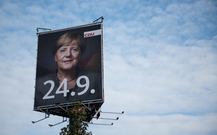 Image: Campaign billboard featuring Angela Merkel