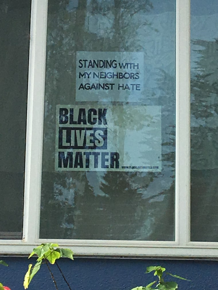 A Black Lives Matter sign is displayed in the window of Debbie Lee's San Francisco home.