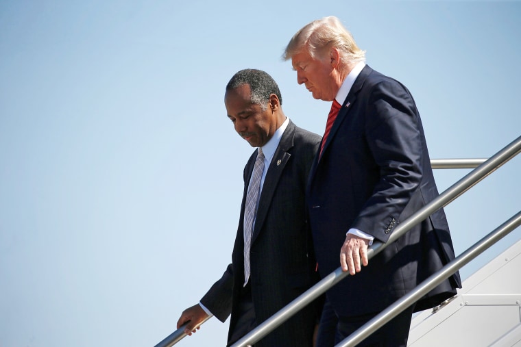 Image: U.S. President Donald Trump and U.S. Secretary of Housing and Urban Development Ben Carson descend from Air Force One in Reno, Nevada