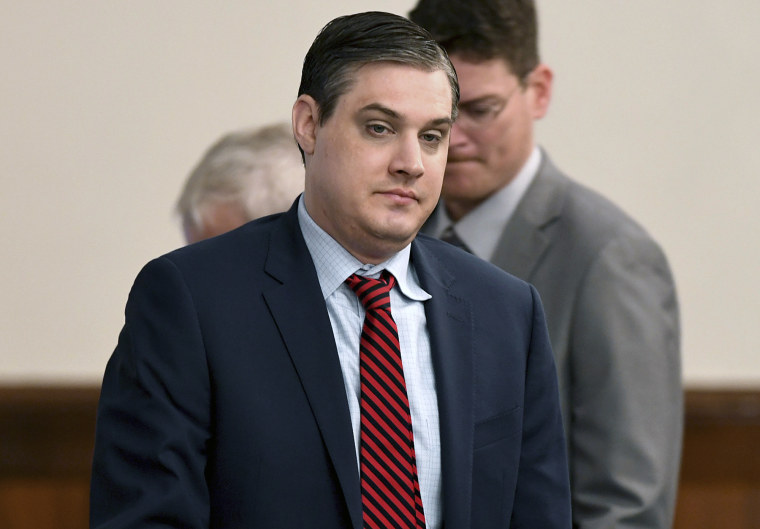 Image: Zachary Adams walks to his seat at the Holly Bobo murder trial