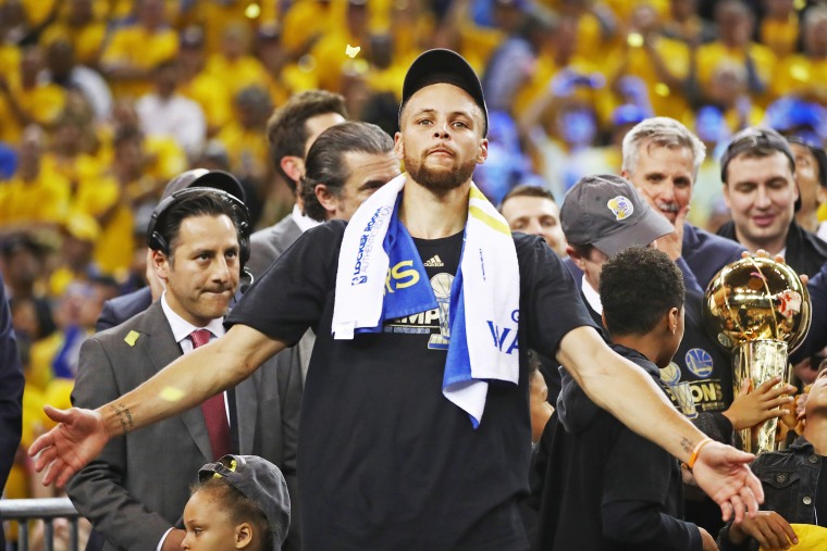 Image: Stephen Curry of the Golden State Warriors celebrates after defeating the Cleveland Cavaliers