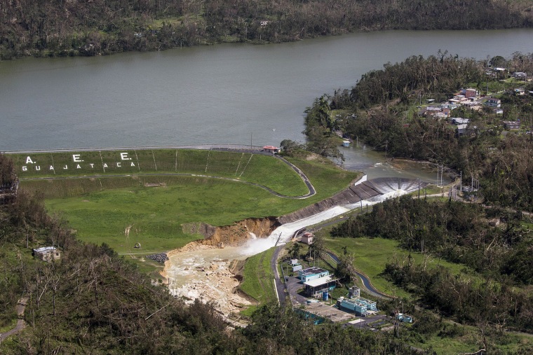 Image: Water drains from the Guajataca Dam in Quebradillas