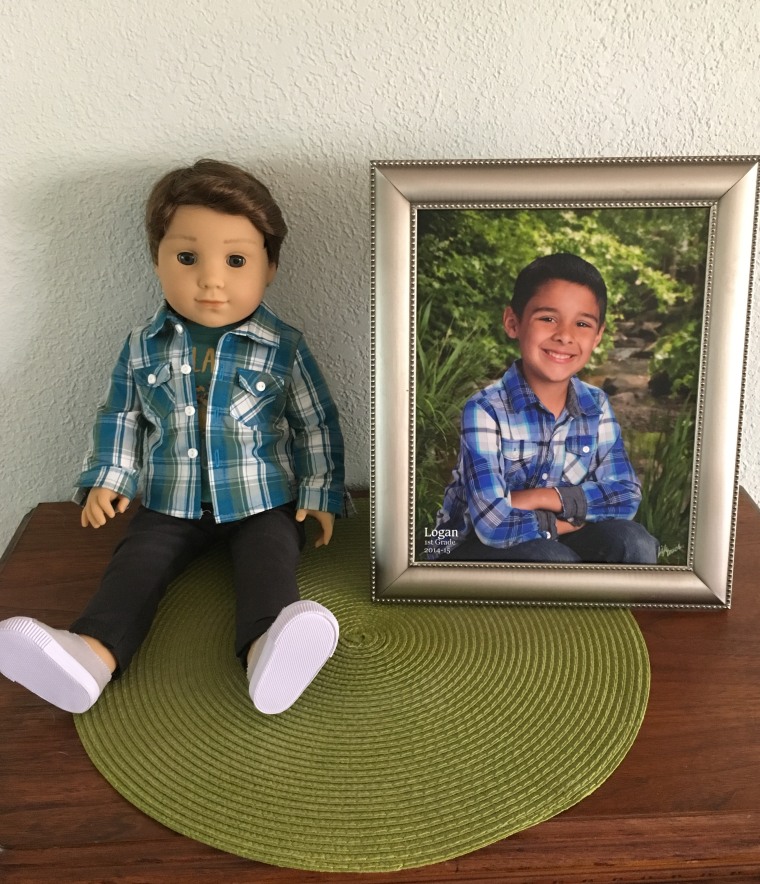 Fortson's Logan doll with her son's school photo.